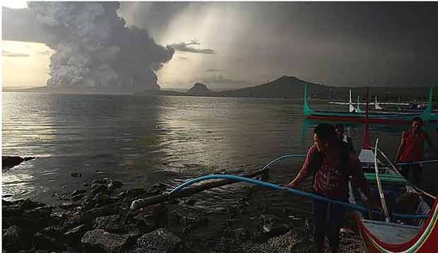Evacuations on the island were underway after Taal Volcano spews pillars of ash and steam Photo: ABS-CBN News