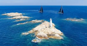 The Monaci lighthouse and rocks form one the most famous course marks at the Maxi Yacht Rolex Cup - photo © Carlo Borlenghi