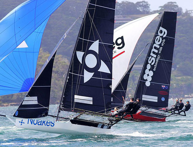 Noakes Blue matches downwind speed against the experienced Smeg team ©Frank QuealeyNoakes Blue team makes a spinnaker run look easy in a North-East wind ©Frank QuealeyThe Kitchen Maker-Caesarstone skippered by Stevphen Quigley ©Frank QuealeySteve Quigley with the young The Kitchen Maker-Caesarstone team ©Frank QuealeyDavid Witt drives Applikancesonline hard off the wind ©Frank QuealeyAnother young team in 2019-20 was Birkenhead Point Marina ©Frank QuealeyNew Zealand's 18ft Skiff Racing Record: C-Tech skipper Alex Vallings has been a leading Kiwi contender for the past decade ©Frank QuealeyNew Zealand's 18ft Skiff Racing Record: Honda Marine on a two-sail reach across Sydney Harbour in 2019 ©Frank QuealeyNew Zealand's 18ft Skiff Racing Record: Honda Marine, spinnaker action in 2019 ©Frank QuealeyStephen Quigley's AEI-Pace Express gave Patrick Corrigan his outright JJ Giltinan World Championship victory in 1996 ©Frank QuealeyPace Express, skippered by David Witt in the early 1990s ©Frank QuealeySouthern Cross, joint champion in 1988 ©Frank QuealeyEmery Worldwide, skippered by twice world champion Howie Hamlin of the USA ©Frank Quealey1996 World Champion Stephen Quigley, seen here with his son Tom, is still heavily involved in the sport as an administrator, coach and parent ©Frank QuealeyThe Kulmar Family - Miles Furniture's spinnaker style ©Frank QuealeyThe Kulmar Family - Miles Furniture wins the start of a championship race in the 1974-75 Season ©Frank QuealeyThe Kulmar Family - Stephen Kulmar with the Giltinan Trophy after Miles Furniture victory in 1976 ©Frank QuealeyThe Kulmar Family - Miles Furniture, 1976 Giltinan champion, upwind on Sydney Harbour ©Frank QuealeyThe Kulmar Family - The winning Miles Furniture after the 1976 JJ victory ©Frank QuealeyThe Kitchen Maker-Caesarstone ©Frank Quealeytech2 ©Frank QuealeyTravelodge New Zealand won the 1974 JJ Giltinan championship ©Frank QuealeyVintec ©Frank QuealeyURM and The Oak Double Bay-4 Pines ©Frank QuealeyBirkenhead Point Marina ©Frank QuealeyRag and Famish Hotel ©Frank QuealeyBird and Bear ©Frank QuealeyShaw and Partners Financial Services ©Frank QuealeyIlve ©Frank QuealeySmeg ©Frank QuealeyFinport Finance ©Frank QuealeyDal Zotto ©Frank QuealeyNoake sailing ©Frank Quealeyappliancesonline.com.au ©Frank QuealeyAeroMedia team get as close to the action as possible to catch Winning Group on a flying spinnaker run ©Frank QuealeySmeg and tech2 are two of the top teams in the League fleet - JJ Giltinan Championship ©Frank QuealeyLee Knapton's 2016 JJ Giltinan Championship champion Smeg on a southerly spinnaker run ©Frank QuealeyNew sponsor URM's skiff in battle with The Oak Double Bay-4 Pines on Sydney Harbour during the JJ Giltinan Championship ©Frank QuealeyShaw and Partners Financial Services skiff improved over the season under the former Australian champion skipper James Dorron - JJ Giltinan Championship ©Frank QuealeySteve Quigley's 1996 JJ Giltinan World Champion AEI-Pace Express ©Frank QuealeyClose fleet racing during the 2019- Season - JJ Giltinan Championship ©Frank QuealeyLeague club President John Winning's 2000 JJ Giltinan Championship-winning AMP Centrepoint ©Frank QuealeyNew sponsor Bird and Bear scored a race win at the JJ Giltinan Championship ©Frank QuealeyBirkenhead Point Marina, one of the new sponsors attracted to the League 18s - JJ Giltinan Championship ©Frank QuealeyAeroMedia Live Broadcast video team during the JJ Giltinan Championship ©Frank QuealeyLegendry USA skipper Howie Hamlin won two JJ Giltinan Championships with this skiff in 2002 and 2003 ©Frank QuealeyNew Zealand's Honda Marine is the current Giltinan world champion ©Frank QuealeyDe'Longhi-Rabbitohs crew with sponsors wearing the famous South Sydney Rabbitohs Rugby League jersey ©Frank QuealeyFamous 'rabbit' logo of the South Sydney Rugby League team was well represented in the 18s just a few years ago ©Frank QuealeySouth Sydney Rabbitohs Squad with the JJ Giltinan Trophy ©Frank QuealeyNew Zealand's C-Tech on the spinnaker run into Rose Bay ©Frank Quealey