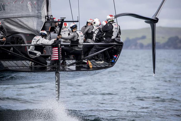 Sean Clarkson (No.9) looks up at the mainsail as American Magic's first AC75, Defiant, goes through its paces on the Hauraki Gulf. © Will Ricketson