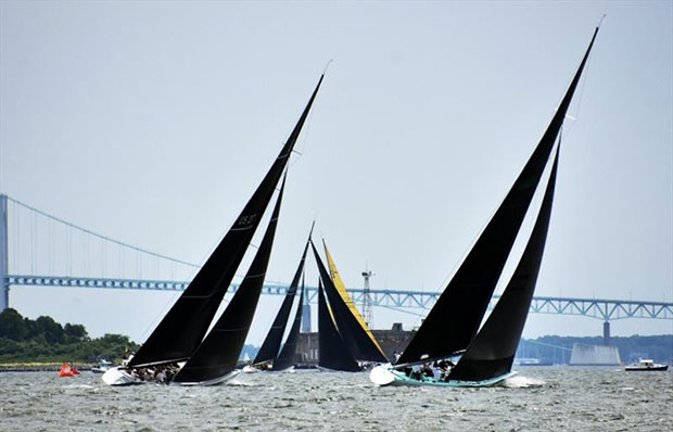 Enterprise (US-27) and Courageous (US-26) chasing the Grand Prix fleet to weather at the 2019 12mR World Championship in Newport, Rhode Island. © SallyAnne Santos