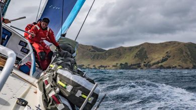 Leaving New Zealand - Volvo Ocean Race Leg 7 from Auckland to Itajai, Day 02 on board Vestas 11th Hour. Tom Johnson, stacking with Coromandel in the background - photo © Jeremie Lecaudey / Volvo Ocean Race