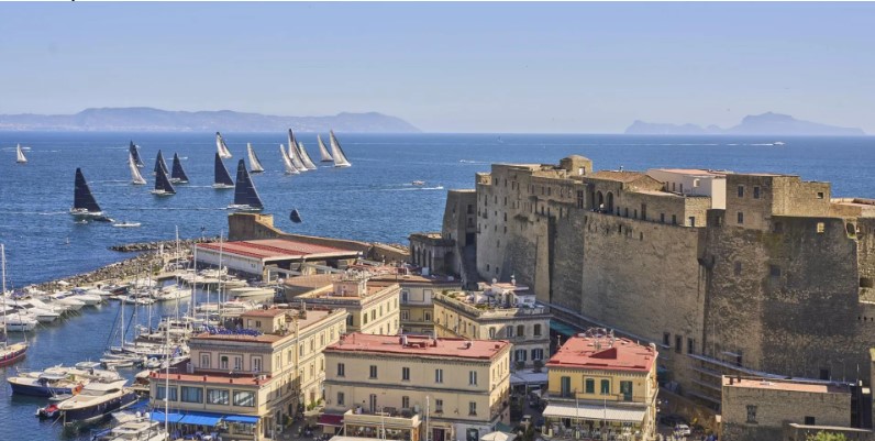The fleet sets sail from Naples' Porticciolo di Santa Lucia and its famous Castel dell'Ovo © Tre Golfi Sailing Week / Studio Borlenghi