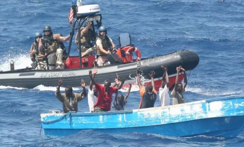 Suspected pirates surrender to the U.S. Coast Guard off the coast of Somalia in 2009. LCDR Tyson Weinert/U.S. Coast Guard Copyright © 2010–2025, The Conversation Media Group Ltd