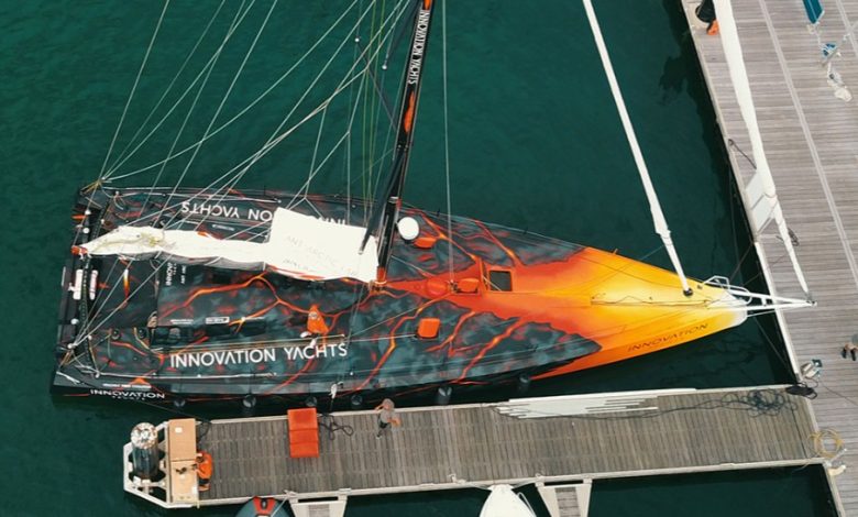 Norbert waving Open60AAL stern after departure © Innovation Yachts